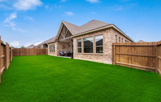 Front entrance with fresh mulch and flowers