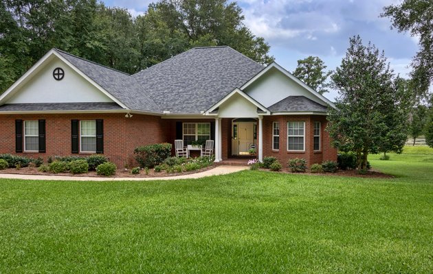 Backyard patio with custom stone design